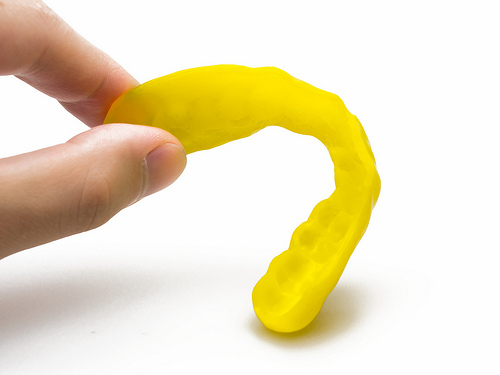 ortho-yellow-mouthguard.jpg